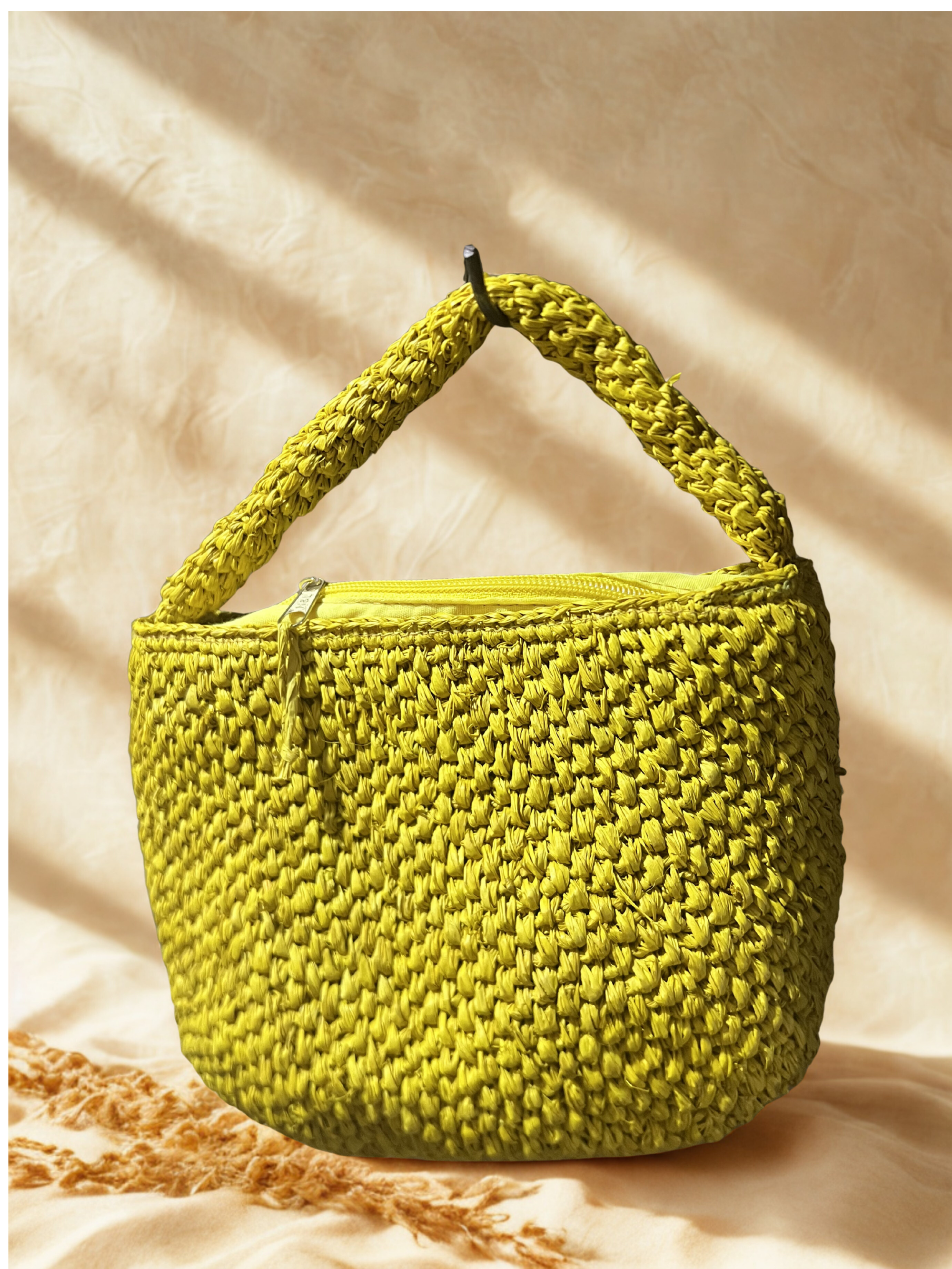 Raffia clutch with fringe tassel